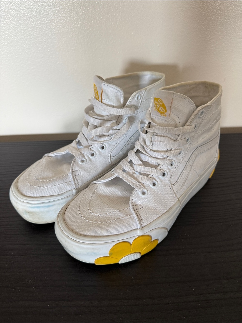 Vans White High-Top Sneakers with Yellow Daisy Accents